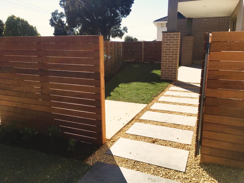 Open Merbau gate and paver path looking into the completed garden